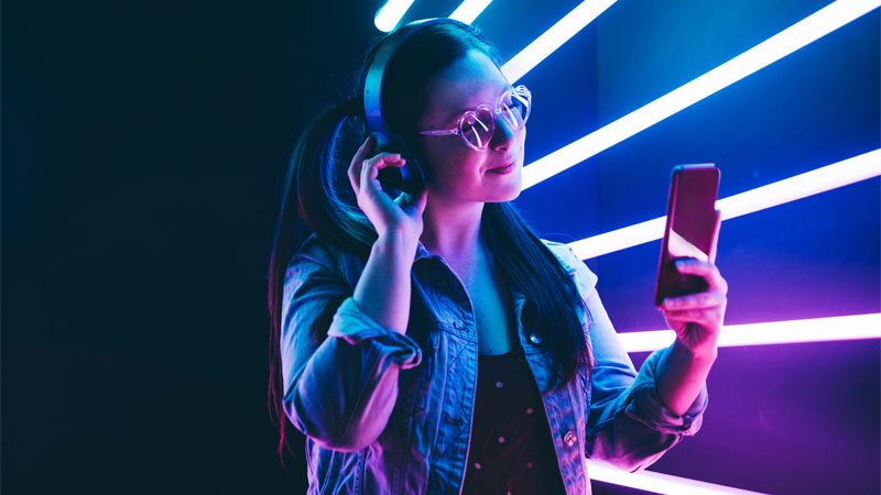 Alphabet Tik Tok Woman Holding Phone Neon Lights
